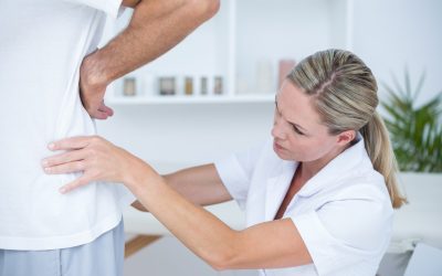 doctor-examining-her-patient-back.jpg